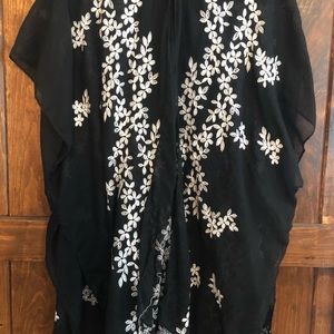 Woman’s sheer coverup floral